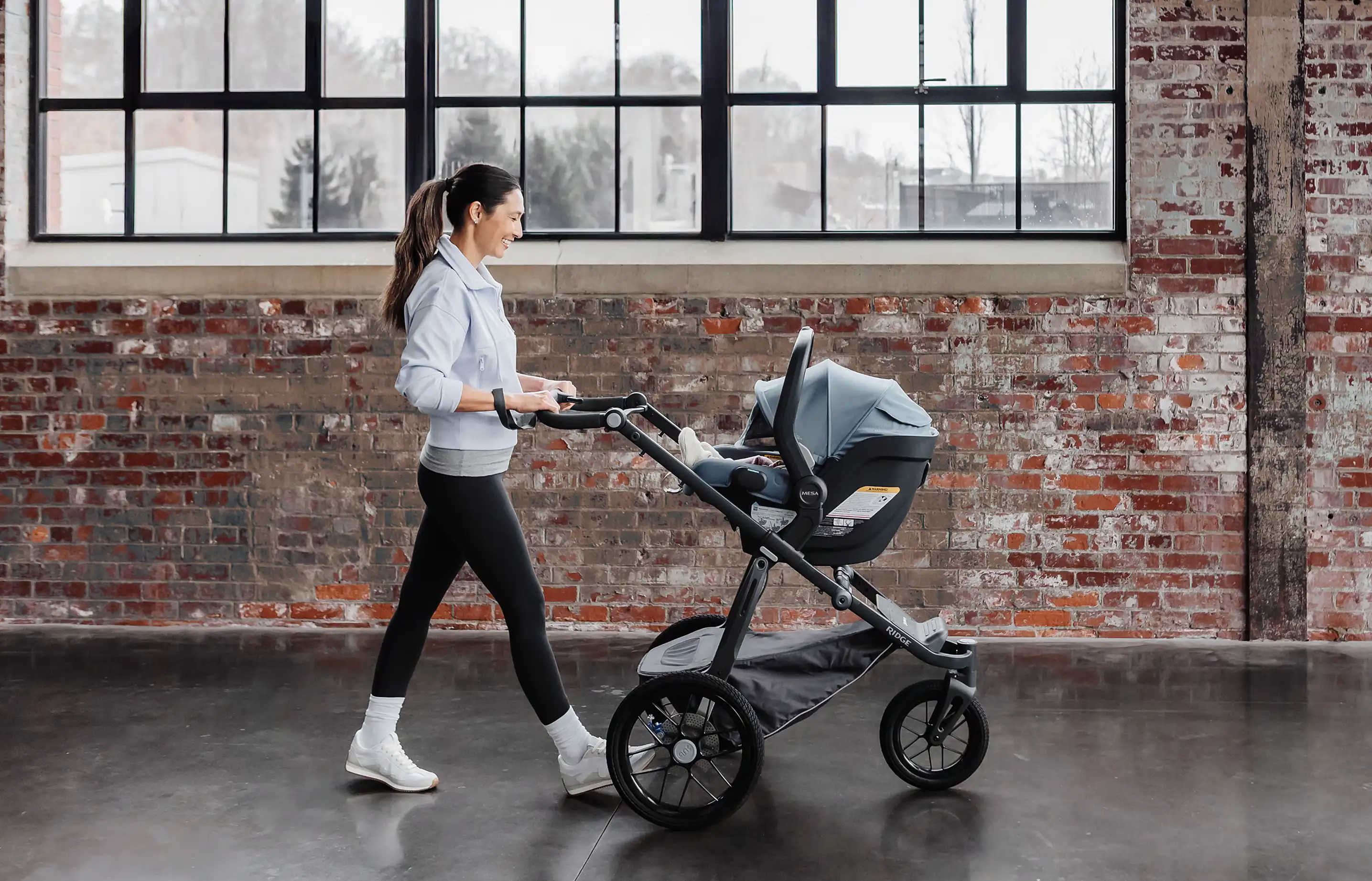 Mother pushing Ridge Stroller with Mesa V3